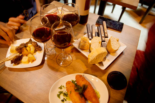 istock Close-Up Of Served Food With Wine On Table 894269502