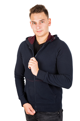 Photo of a confident man zipping  his hoodie