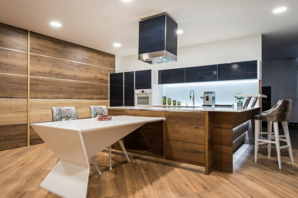 modern kitchen with counter top and stove under chimney - domestic kitchen kitchen sink contemporary counter top imagens e fotografias de stock