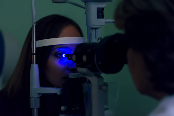 istock Young woman Undergoing Eye Examination 894302696
