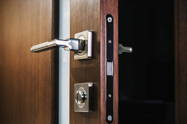 istock door handle and latch of brass on veneer 894309448