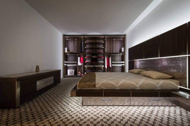 istock Modern bedroom with double bed and built in closet 894315166