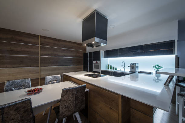 table with seats and counter top in kitchen - domestic kitchen kitchen sink contemporary counter top imagens e fotografias de stock