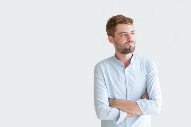 istock Portrait of Content Young Man with Folded Arms 894315626