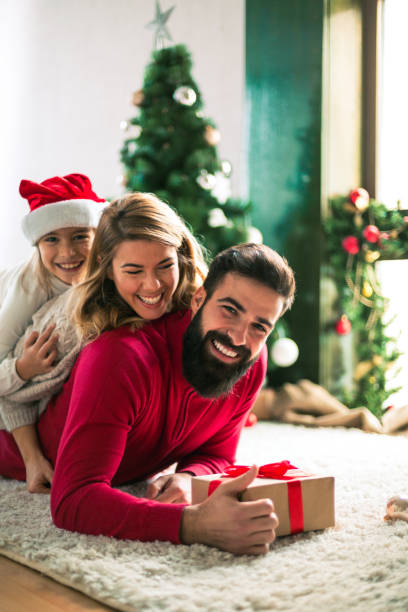 Family celebrating Christmas at home.