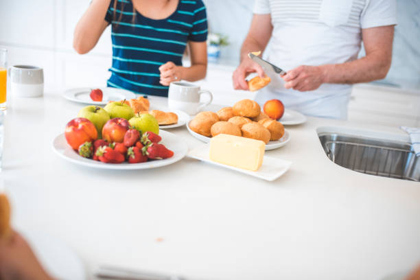 istock Family having breakfast in the kitchen 894340564