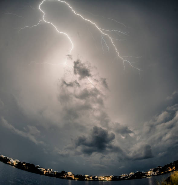 massive hurrican harvey storm clouds with lightning at night. - hurrican imagens e fotografias de stock