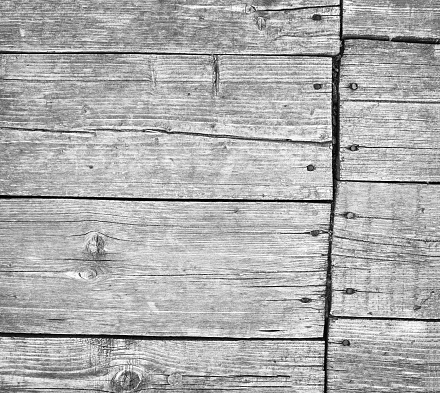 Close-up black and white grunge old wood board wall texture