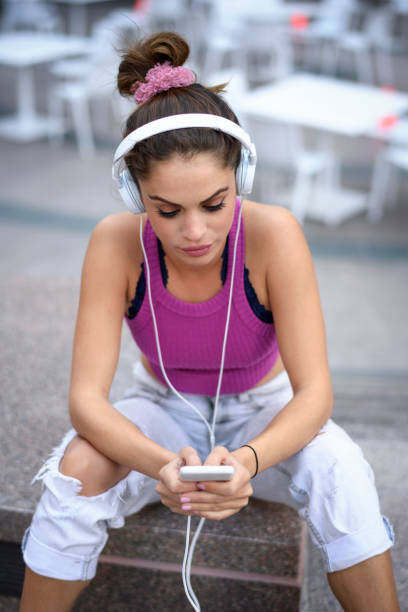 istock Young woman in the city 894348832