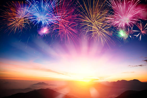 istock mountain with sunrise and fireworks background 894353250
