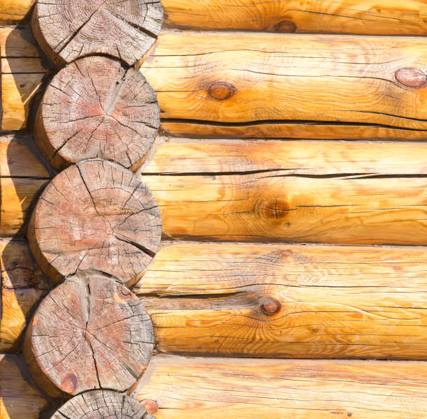 istock Wall of a house with a log frame as a background 894360754