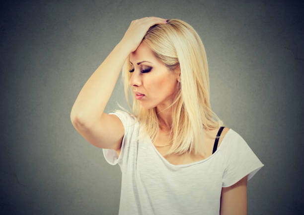 istock Unmindful woman looking desperate 894360776