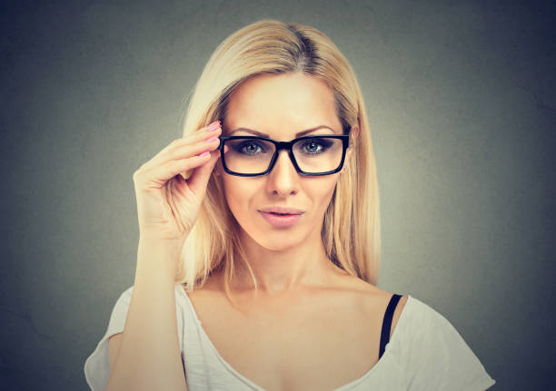 istock Young confident woman in eyeglasses 894360778