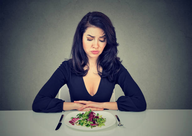 istock Woman having dissatisfying diet 894361370