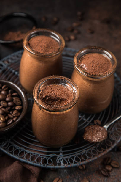 istock chocolate coffee mousse in glass jars 894361654