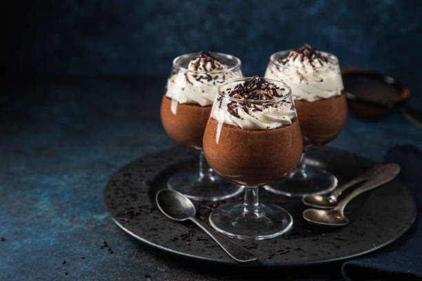 istock chocolate mousse served with whipped cream 894361656