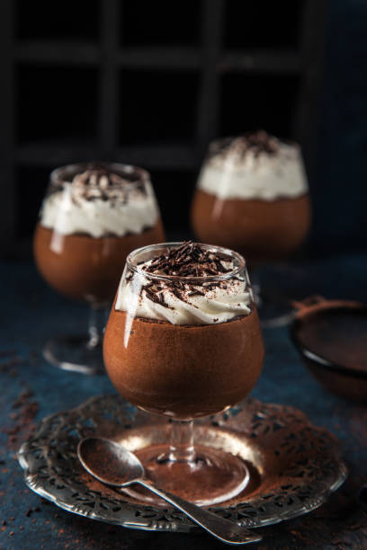 istock chocolate mousse served with whipped cream 894361660