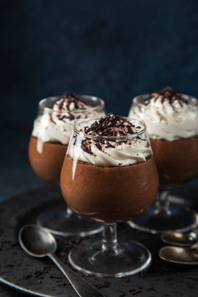 istock chocolate mousse served with whipped cream 894361672