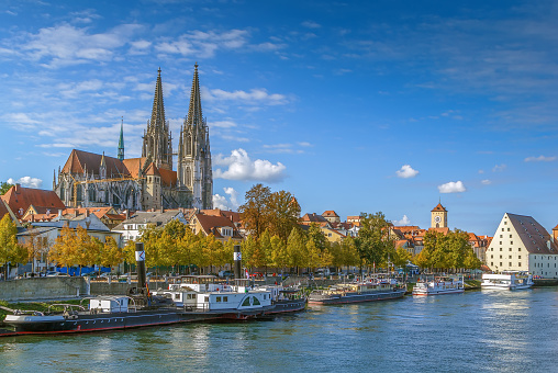 View of old town of Regensburg with st. Peter Cathedral from Danube river, Germany