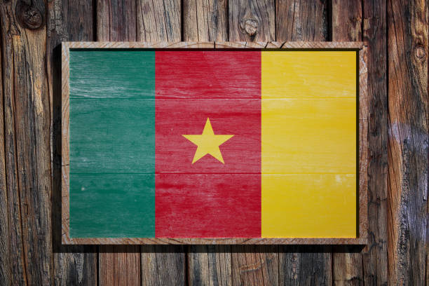 3D rendering of Cameroon flag waving on blue sky background, National Day is a holiday in Cameroon celebrated on 20 May.