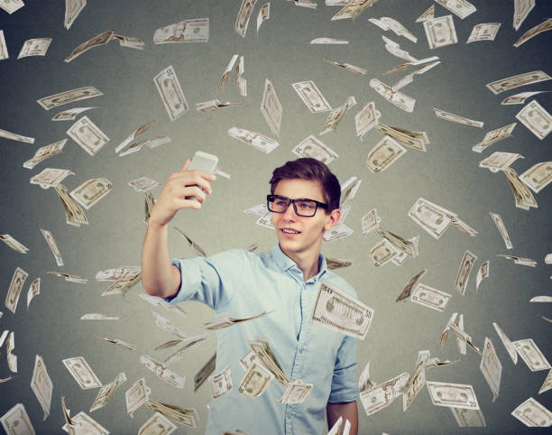 istock Man earning money with social media 894372372