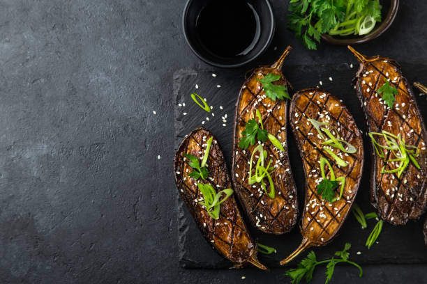 istock glazed grilled eggplants served with sesame seeds and green onion 894372814