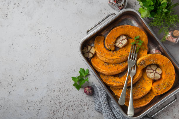 istock roasted pumpkin slices with spicy herbs and garlic 894372826