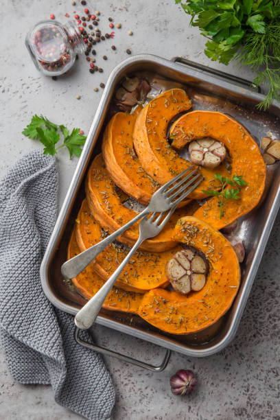 istock roasted pumpkin slices with spicy herbs and garlic 894372830
