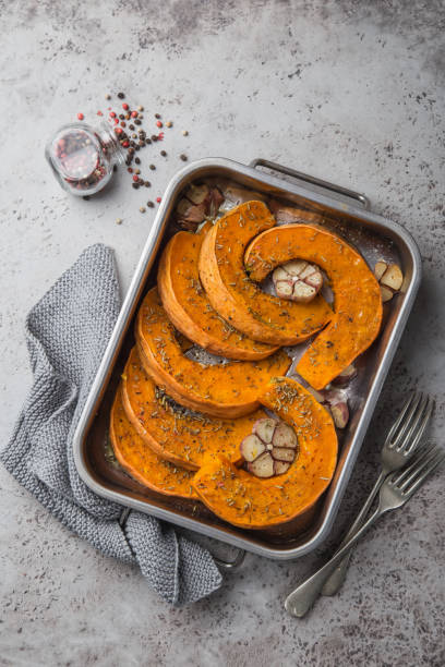 istock roasted pumpkin slices with spicy herbs and garlic 894372842