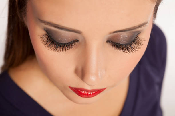 istock Closeup of eyelashes extension. False eyelashes 894378806