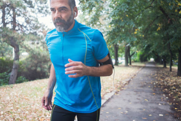 istock Man jogging outdoors 894383506