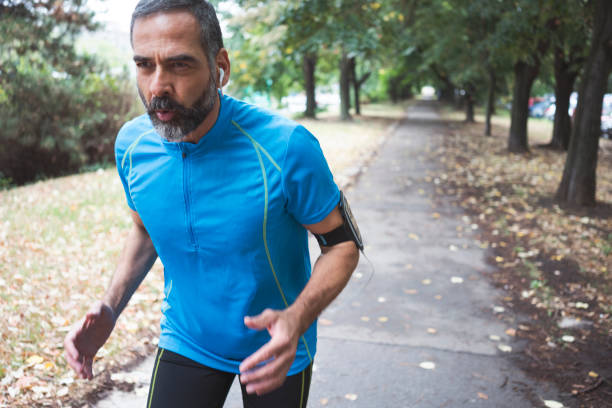 istock Man jogging outdoors 894383742