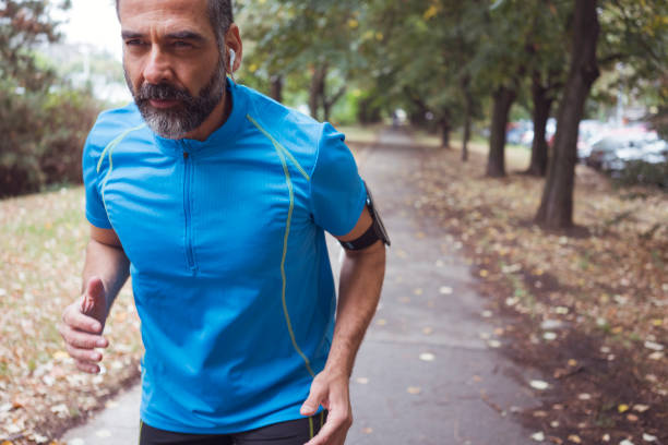 istock Man jogging outdoors 894383796