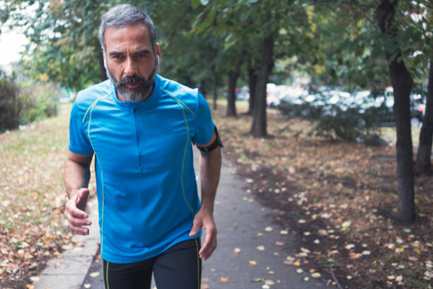 istock Man jogging outdoors 894383930