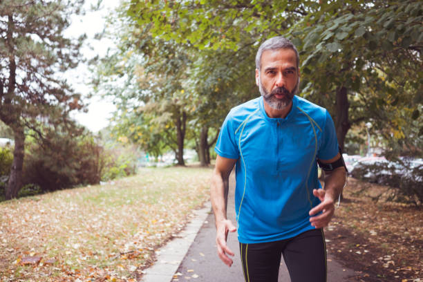 istock Man jogging outdoors 894384186