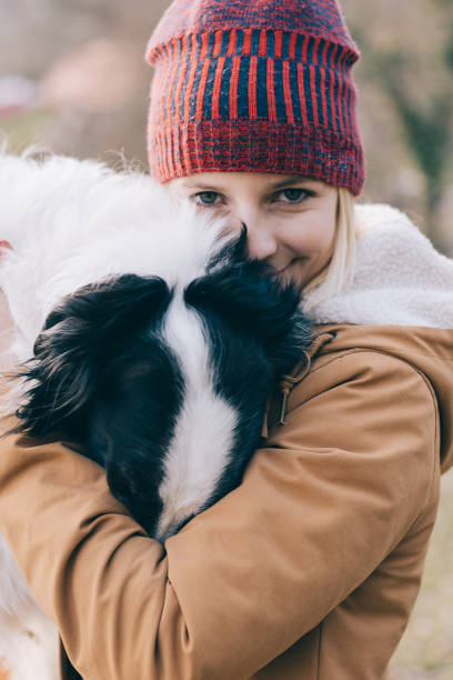 istock Young woman and her dog having fun together. 894390476