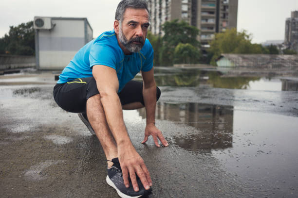 istock Man jogging outdoors 894393278