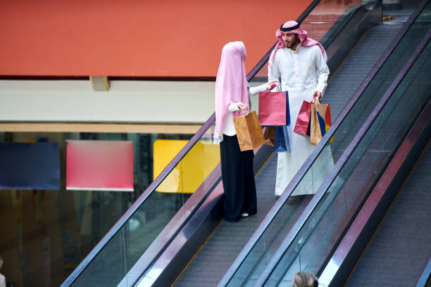 istock Young muslim couple shopping 894393490