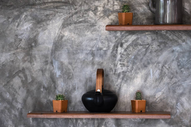 istock Concrete wall background texture grunge and grey surface with shelves and accessories, empty space for add text or image. Loft style. 894393682