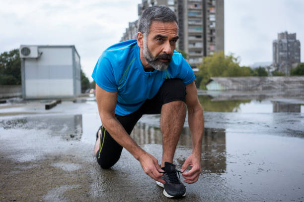 istock Man jogging outdoors 894396274