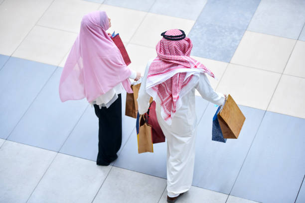 istock Young muslim couple shopping 894396276