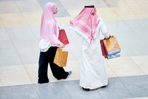 istock Young muslim couple shopping 894399732