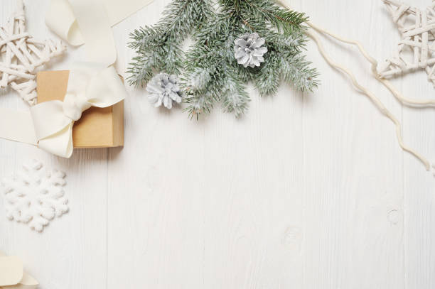 istock Mockup christmas or new year frame composition with space for your text. christmas decorations on white wooden background. holiday and celebration concept for postcard or invitation. top view 894400318