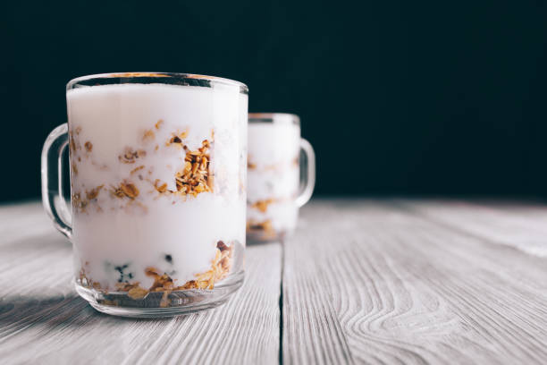 istock Healthy breakfast with yogurt in glass cups 894400552