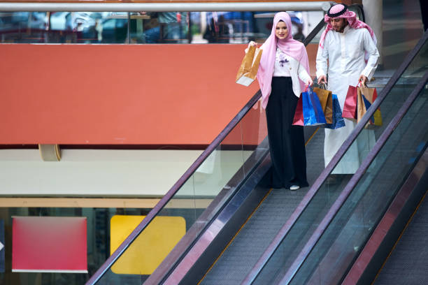 istock Young muslim couple shopping 894405184