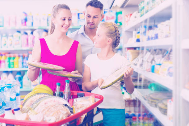 istock Family of three are choosing pizza 894408164