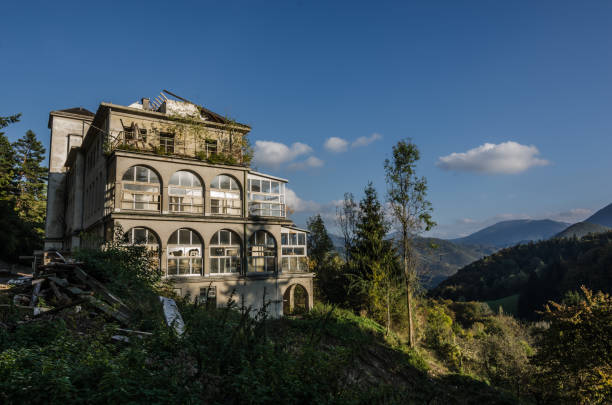 istock abandoned children's hospital mountains 894409598