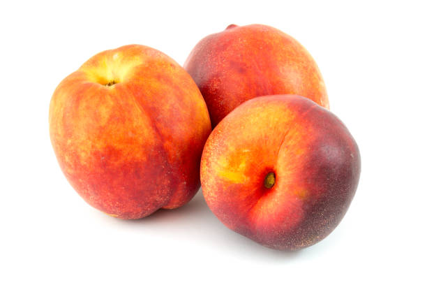 istock Fresh pineapple peaches isolated on white background. 894413388