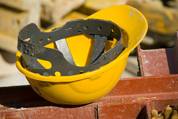 Close up of hard hat at construction site stock photo