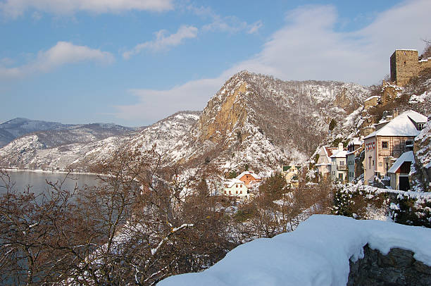 Winter mountain landscape of Pilis hills and Danube river at Dobogoko, Hungary. Frosty trees and snowy forest.